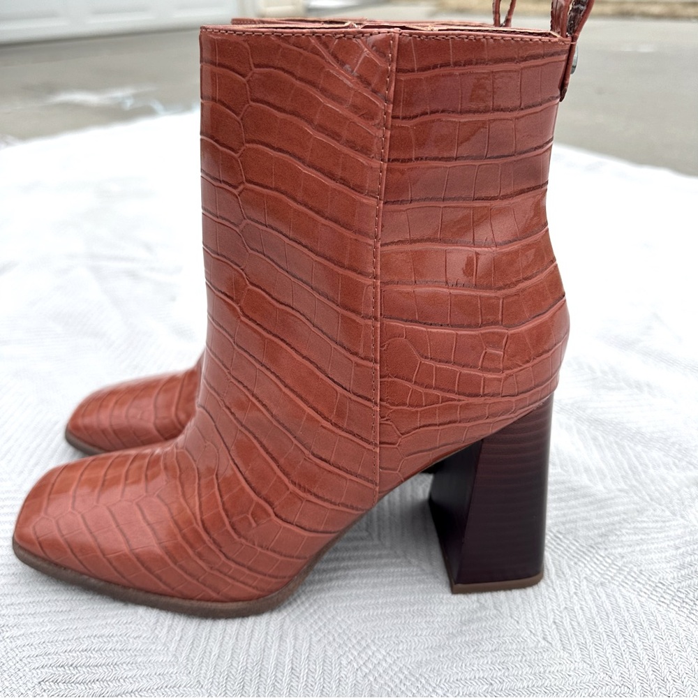 Circus by Sam Edelman croc embossed heeled boots.